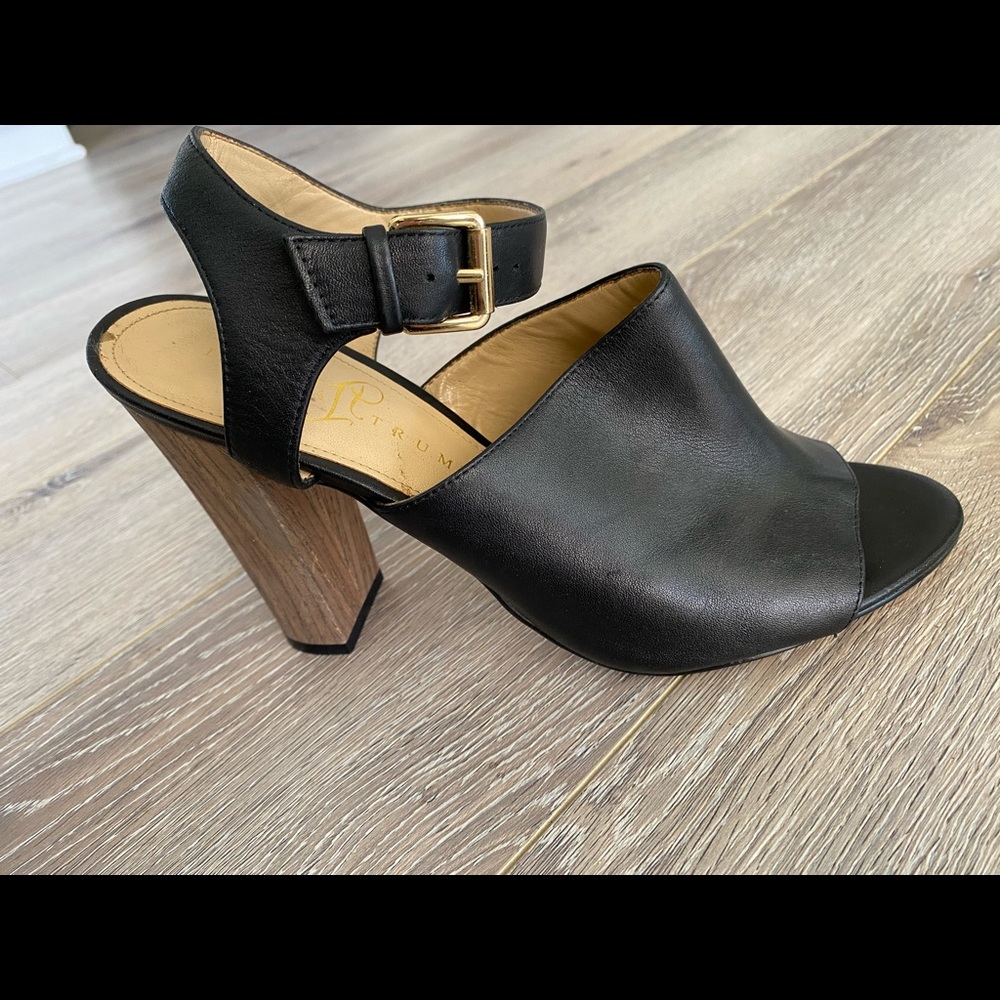 High healed leather with strap.